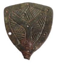 Anglo-Saxon, 6th-century, bronze shield-shaped pin head, 35mm x 30mm, decorated on the face...