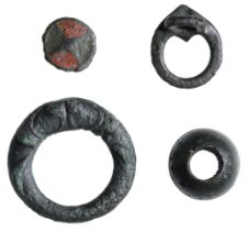 Celtic, bronze artefacts (4), 1st century AD, comprising toggle with boss and petal motif mo...