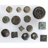 Byzantine, bronze weights, square (4), round (7); together with Islamic polyhedral bronze we...