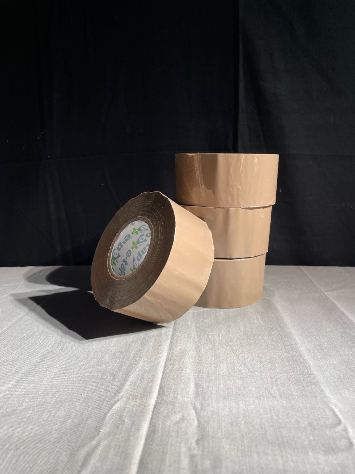 4x new rolls of brown parcel tape.