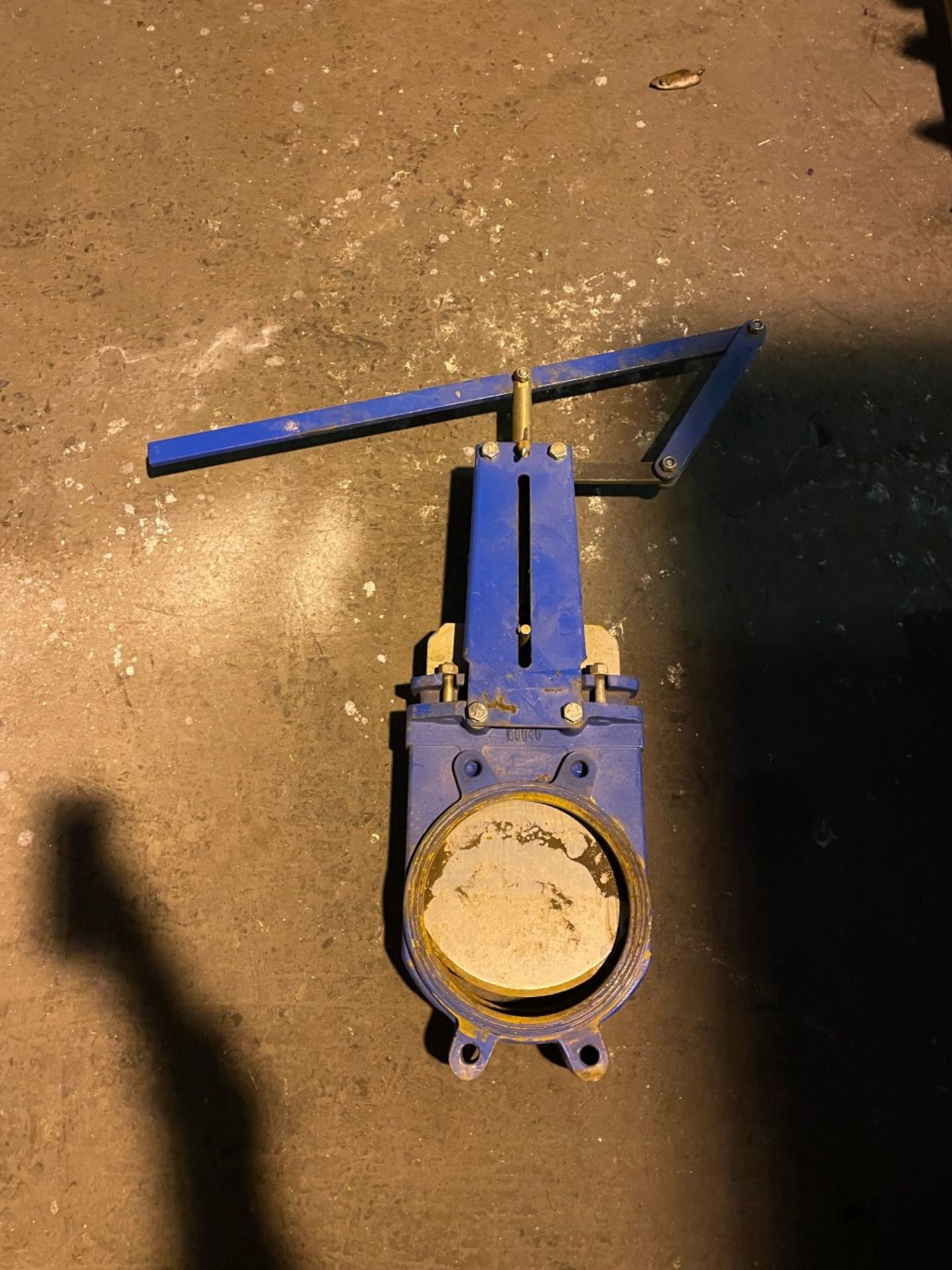 8” cast iron Lever operated knife gate valve. For use on the bottom of hopper or similar. Used but