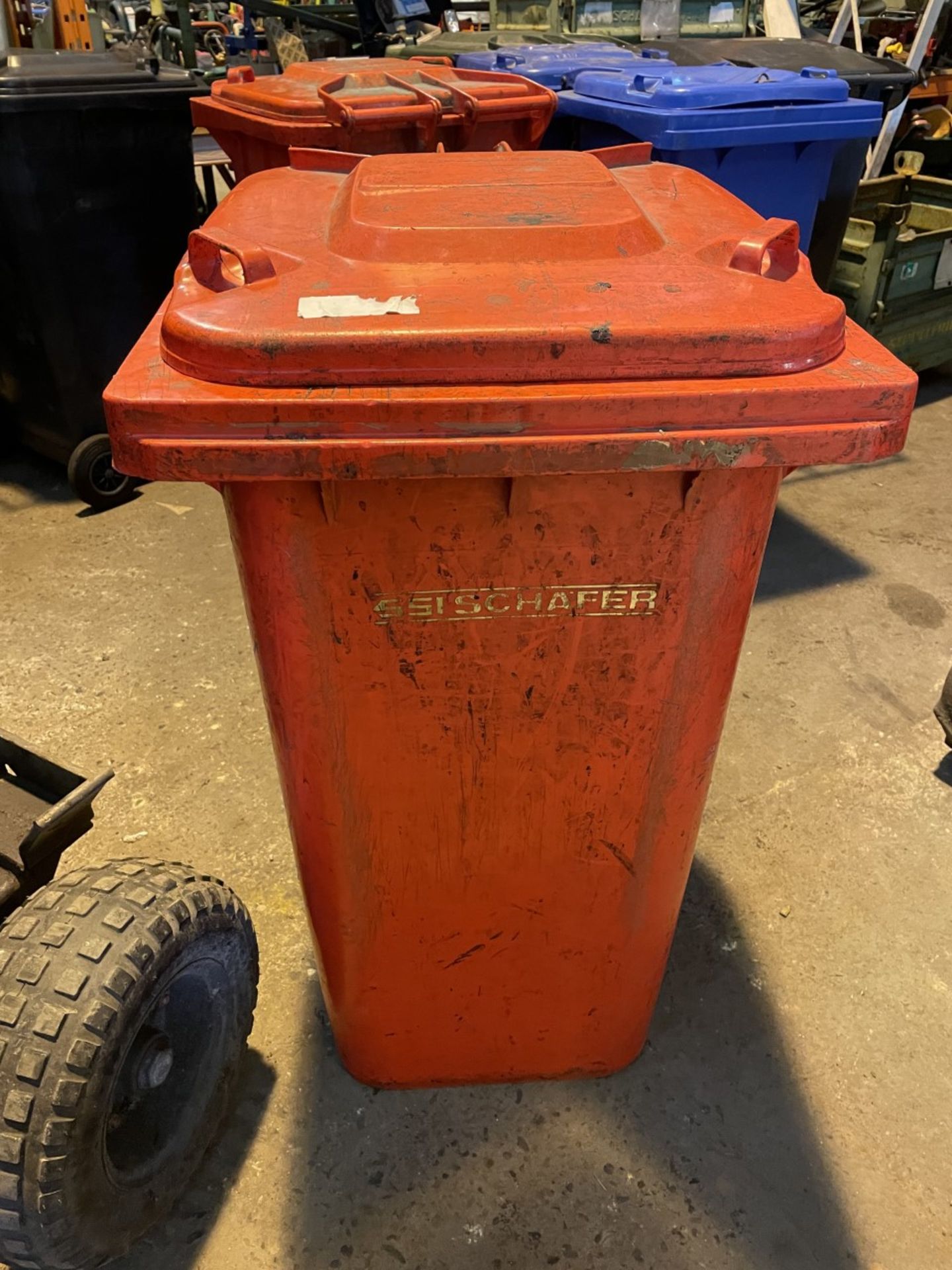 Red wheelie bin. Good condition
