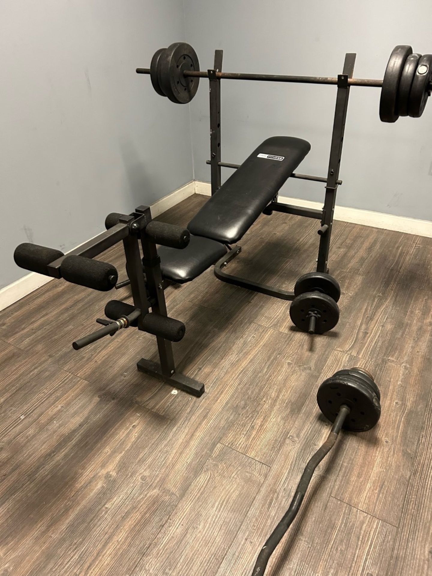 Gym gear. Bench press bench, long bar, dumbbells and weights. Good condition