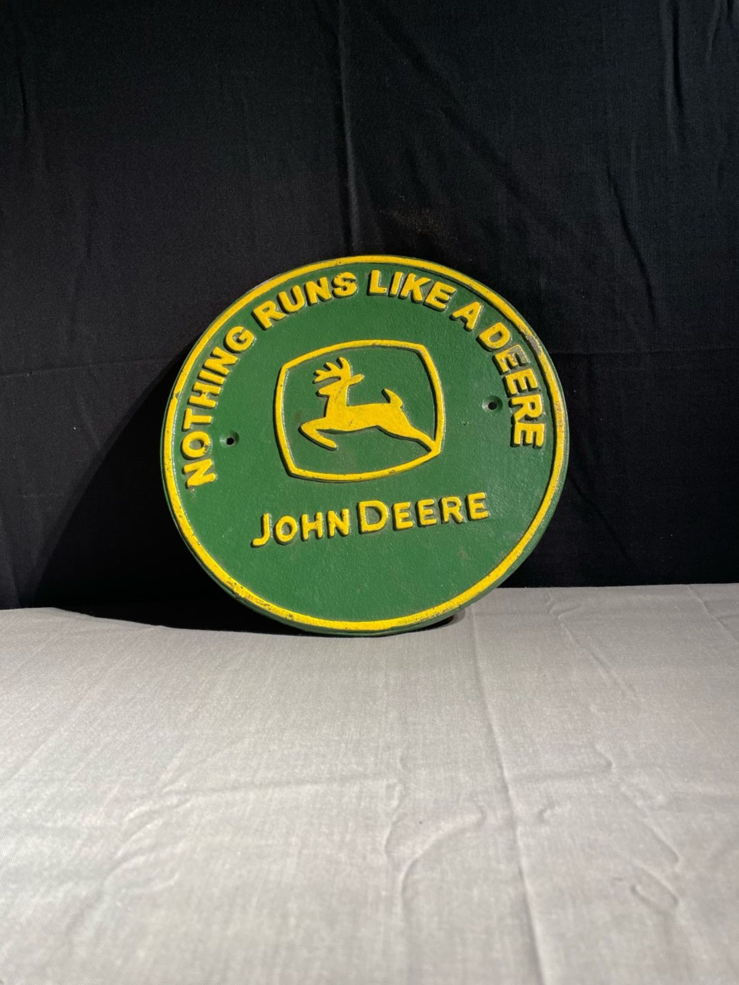 John Deere nothing runs like a Deere cast iron plaque.