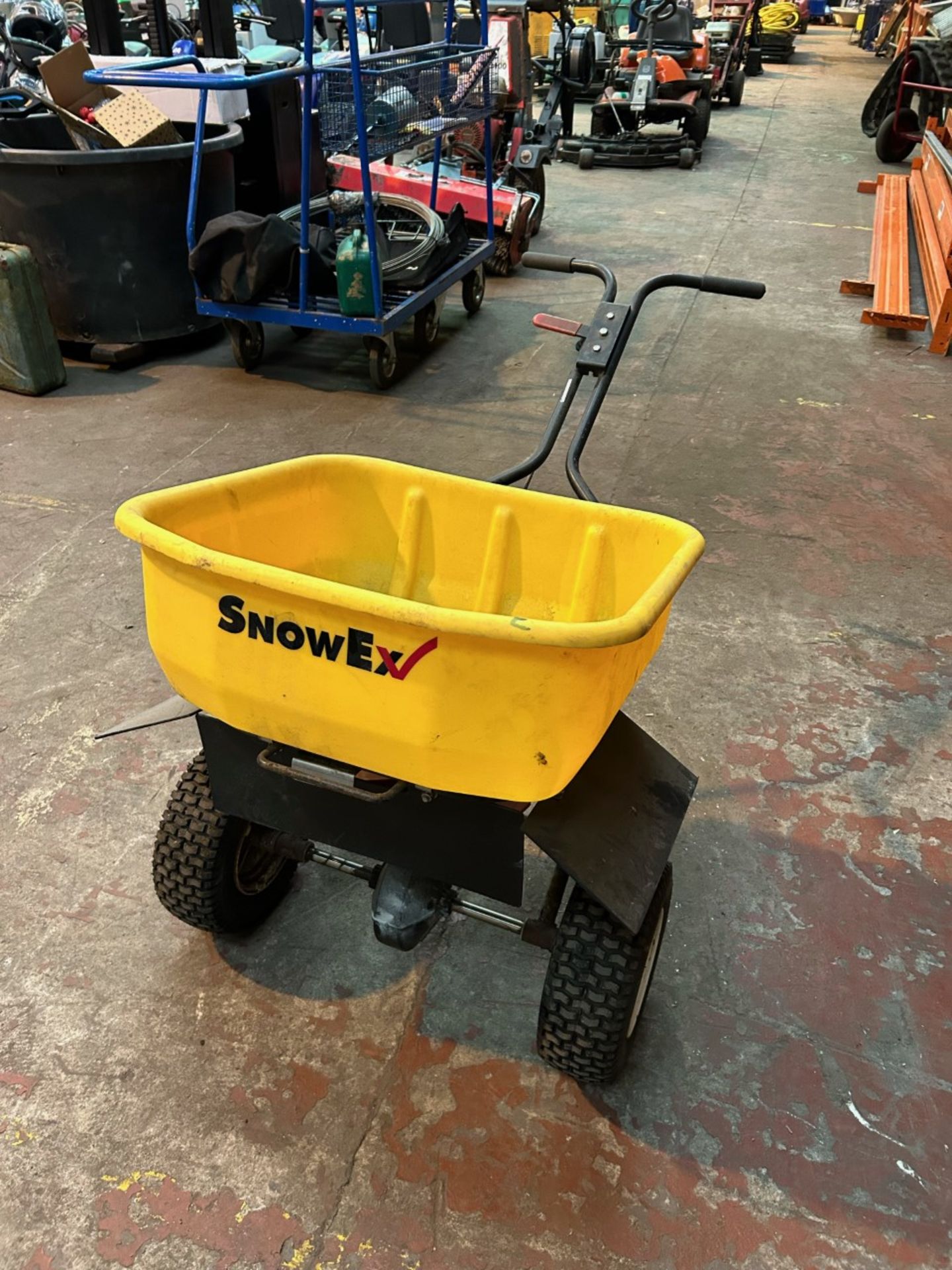 Snowex dcc2091 walk behind spreader. Excellent condition full working order