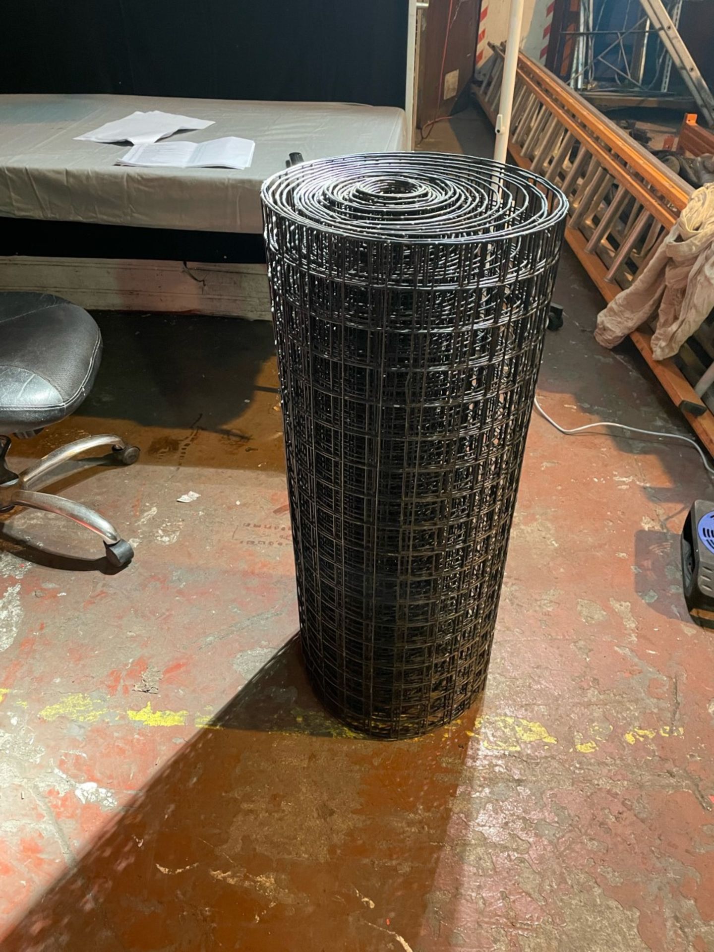 New 25m roll of pvc coated black wire mesh. 3ft tall.