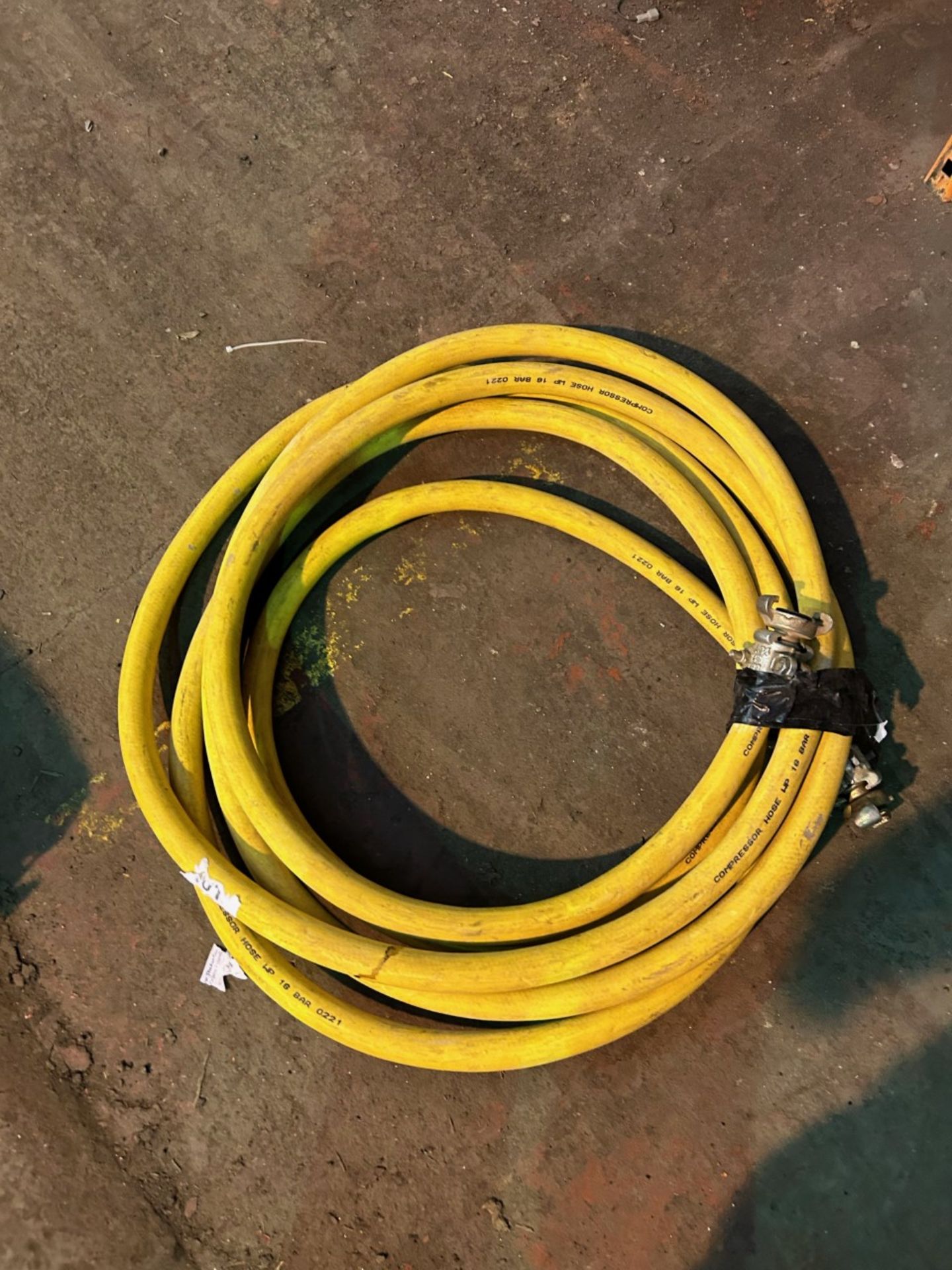 Approximately 5m of 3/4” compressor air hose with couplings