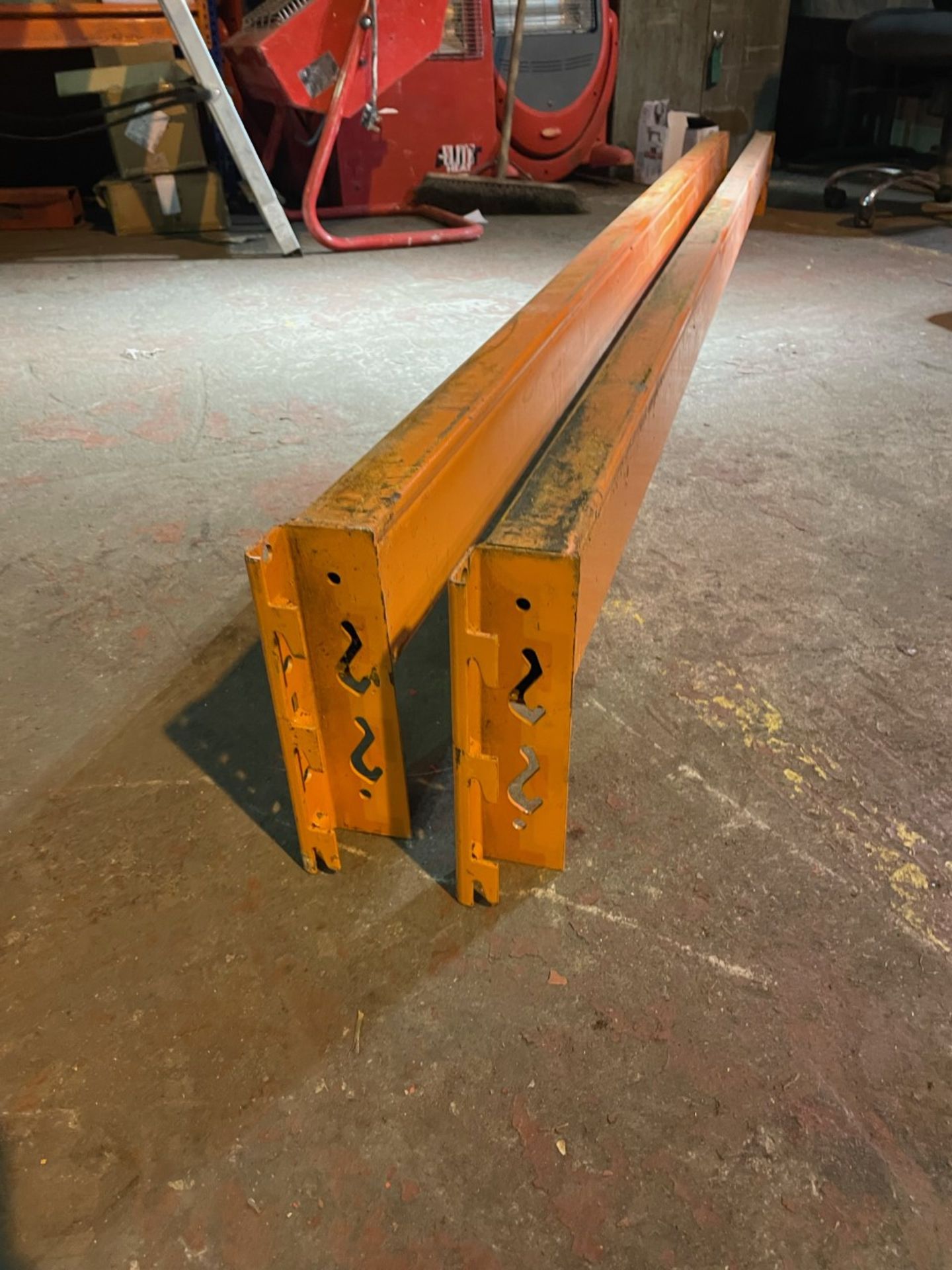 2x Orange racking beams. 2700mm in length. Good condition all connections are straight