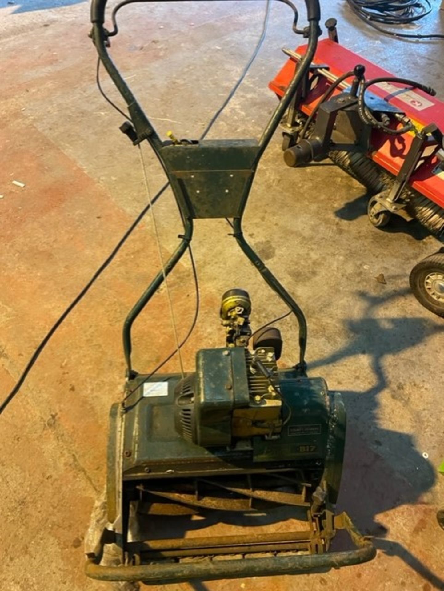 Old push along roller mower