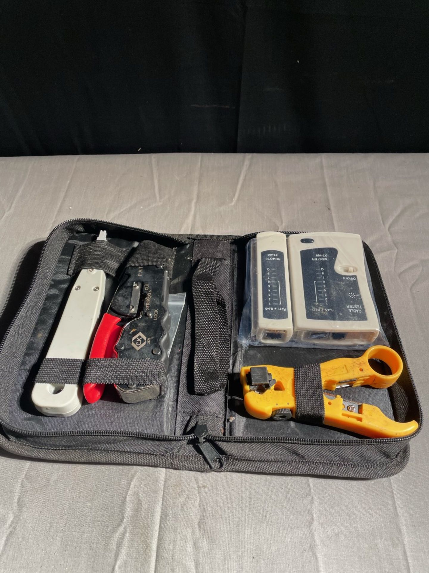 Structured cabling installers kit. Includes tester, crimp tool, punch down tool and cable