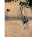 Coopers battery powered pole saw. No charger good condition