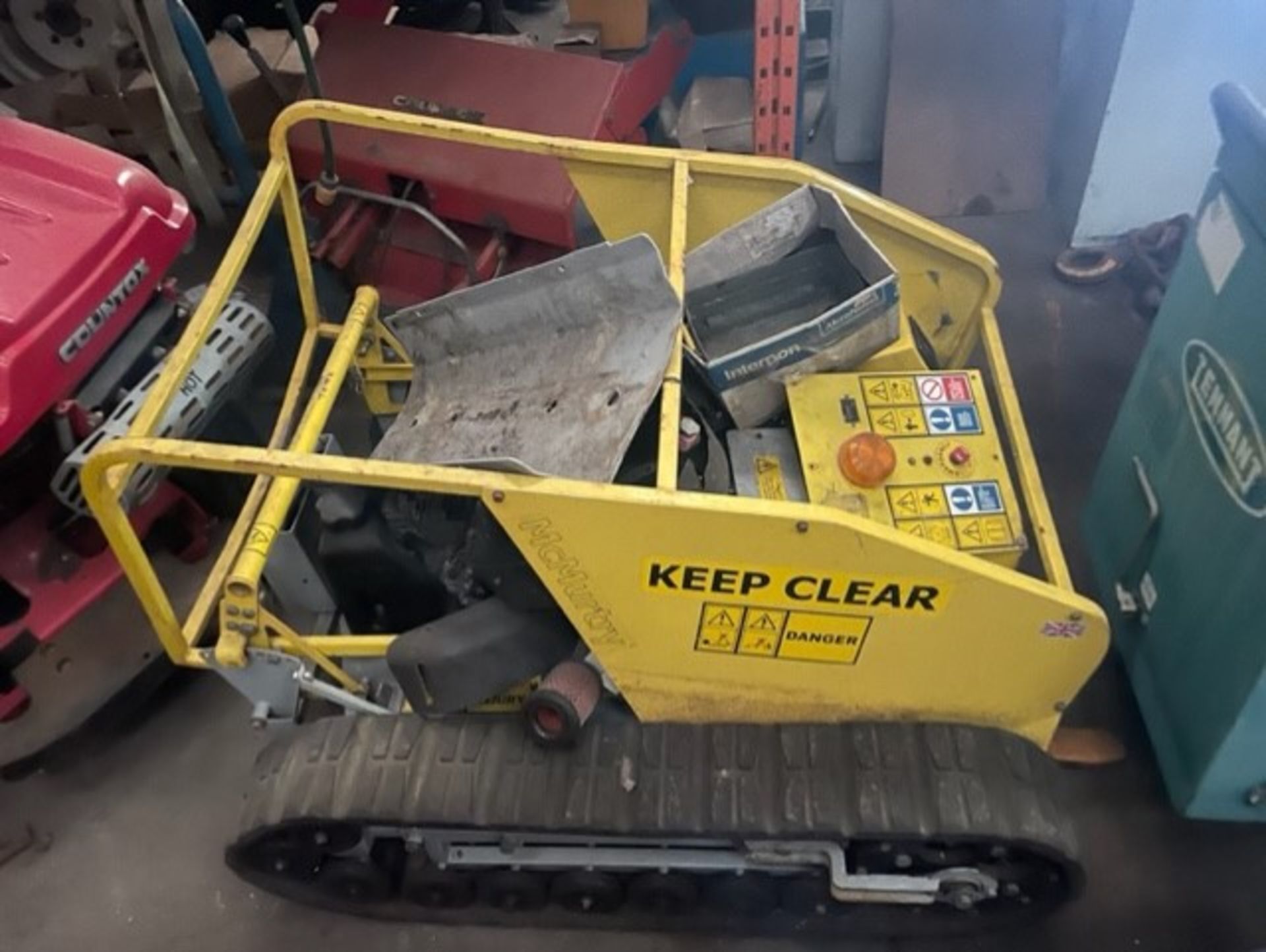 Robotic tracked mower had slight problem then a mechanic stripped it  and then left it  in bits