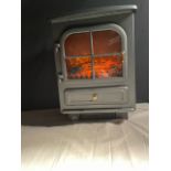 New in box traditional 1.8kw cast iron effect electric stove. The 4 legs are missing out of the