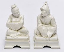 Paar Figuren: Sitzende Chinesen, Nymphenburg wohl 19. Jh.