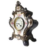 A ROYAL BONN PORCELAIN MANTEL CLOCK CIRCA 1900 of bombe-form the sides decorated with brightly