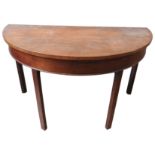 A 19TH CENTURY MAHOGANY DEMI LUNE TABLE,of simplistic form, on four chamfered legs, 71 x 122 x 60 cm