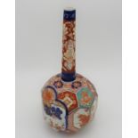 JAPANESE IMARI FACETTED BOTTLE VASE MEIJI PERIOD (1868-1912) decorated in the typical palette 35cm