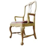 A QUEEN ANNE STYLE ELBOW CHAIR, with pierced vasiform splat and scroll arms, the cabriole legs