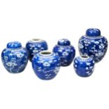 A COLLECTION OF SIX ASSORTED CHINESE 'CRACKED-ICE' BLUE AND WHITE GINGER JARS LATE QING DYNASTY