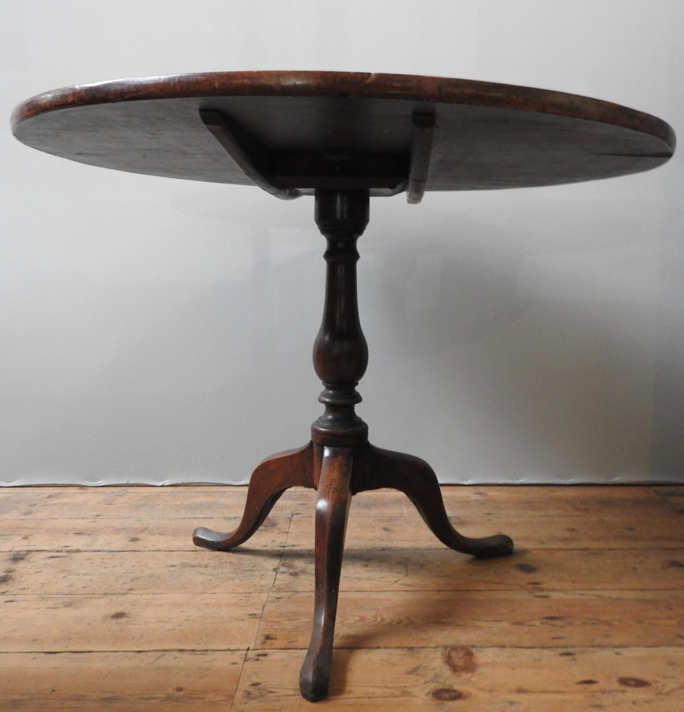 A GEORGE III MAHOGANY TILT TOP TRIPOD TABLE, the circular single piece top sat atop a turned - Image 3 of 3