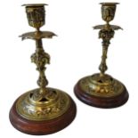 A PAIR OF VICTORIAN LACQUERED BRASS CANDLESTICKS, in the Renaissance style, late 19th century, on