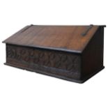 AN 18TH CENTURY OAK DESK BOX, with iron hinges, the frieze panel carved with a repeating lozenge and