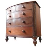 A 19TH CENTURY MAHOGANY BOW FRONT CHEST, two short drawers over three graduated long drawers,