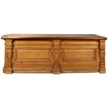 A LARGE 19TH CENTURY HABERDASHERY COUNTER, comprised of a substantial mahogany counter top sat