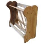 A VINTAGE PINE PLATE  RACK, of simplistic rustic form (49cm high, 51cm wide, 20cm deep)