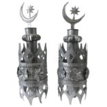 A PAIR OF ZINC ROOF COWLINGS, originating from Kyrgyzstan, of crown form, the pierced rivetted