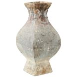 A CHINESE EARTHENWARE VASE NEOLITHIC PERIOD of square baluster form 47cm high Provenance: From the