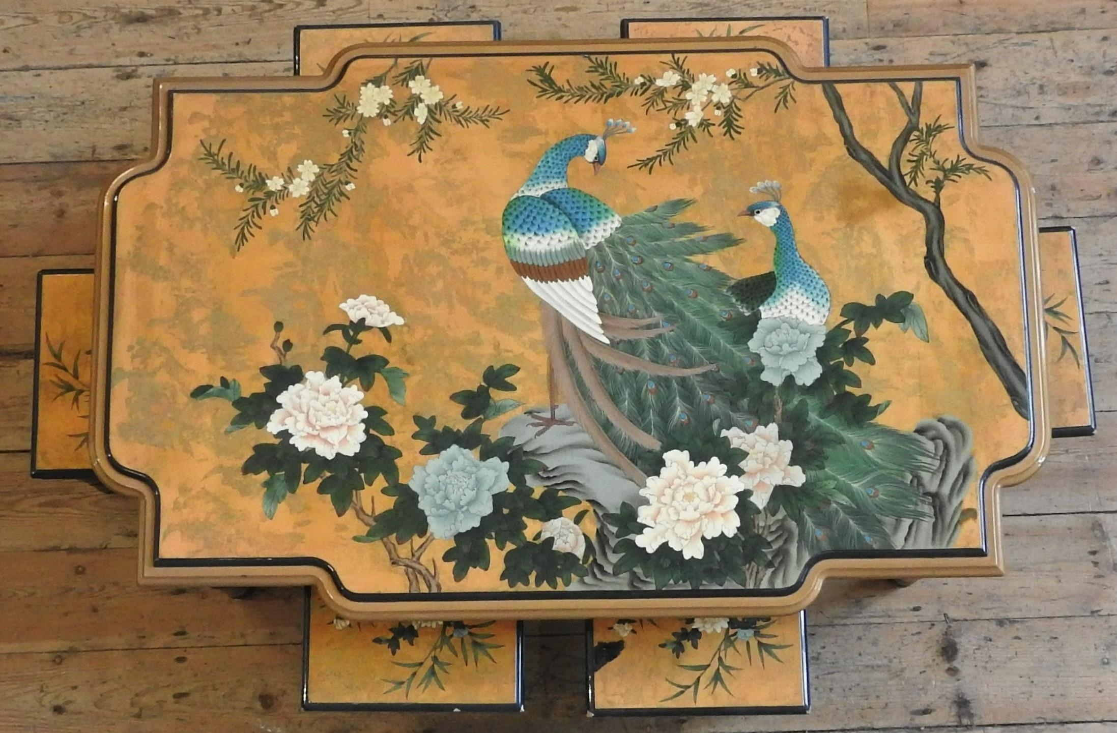 A CHINESE LACQUER TABLE AND SIX STOOLS, decorated with two peacocks perched amongst flowering - Image 2 of 3