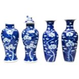 PAIR OF CHINESE BLUE AND WHITE 'PRUNUS AND CRACKED-ICE' BALUSTER VASES  LATE QING DYNASTY together