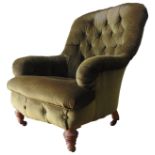 A 19TH CENTURY BUTTON UPHOLSTERED TUB CHAIR, covered in an emerald green material, raised on tapered