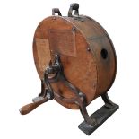 A 19TH CENTURY SPONG & CO. KNIFE SHARPENER, oak drum body on a cast-iron stand, 36 cm diameter,