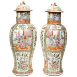 A LARGE PAIR OF CHINESE FAMILE ROSE COVERED VASES QING DYNASTY, 19TH CENTURY decorated in the