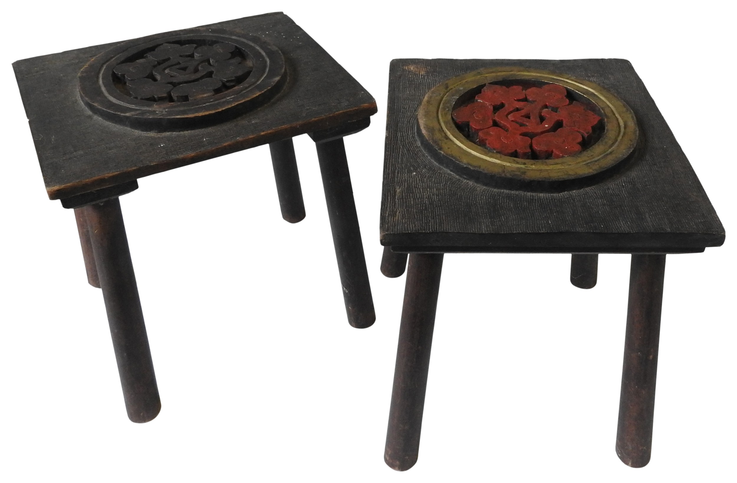 TWO SMALL CARVED INDIAN STOOLS, the seat panels decorated with carved lotus flower roundels, 28 x 24