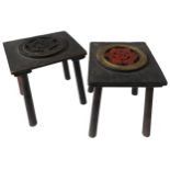 TWO SMALL CARVED INDIAN STOOLS, the seat panels decorated with carved lotus flower roundels, 28 x 24