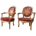 A PAIR OF LOUIS XI-STYLE GILT WOOD FAUTEILS, 20th century, covered in a burgundy damask material