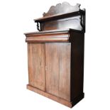 A VICTORIAN ROSEWOOD CHIFFONIER, a fret cut gallery back with upper shelf with scroll supports,
