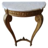A FRENCH GILT GESSO CONSOLE TABLE, with a shaped white marble top over a foliate rosette frieze