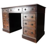 A LATE 19TH CENTURY MAHOGANY WRITING DESK, a leather inset top section with three frieze drawers (