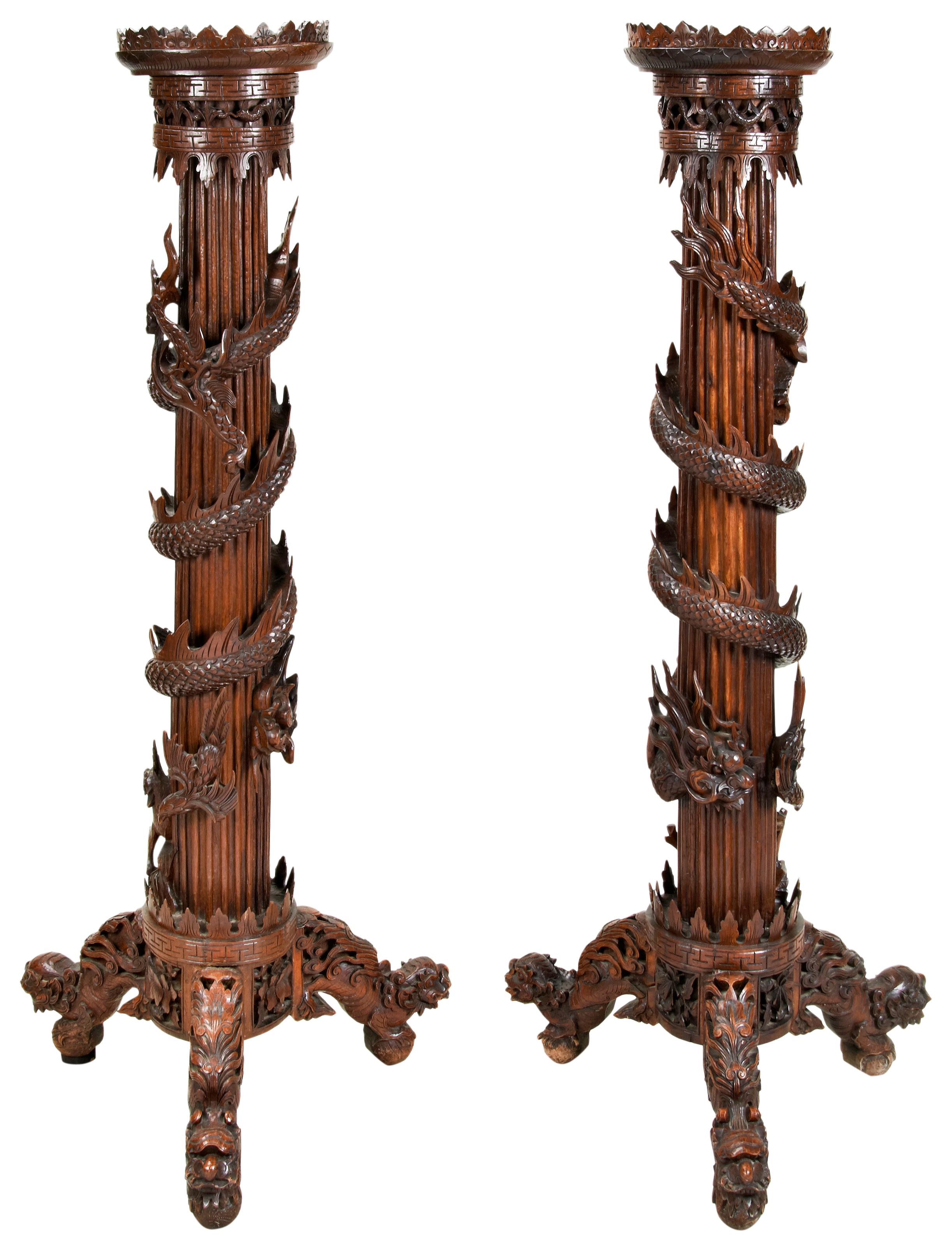 IMPRESSIVE PAIR OF DRAGON-CARVED HUANGHUALI STANDS QING DYNASTY, 19TH CENTURY the circular