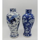 TWO CHINESE BLUE & WHITE BALUSTER VASES, late Qing Dynasty, each bearing apocryphal Kangxi four