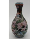 A CHINESE FAMILLE NOIR BALUSTER VASE, 20th century, in the Kang Xi style, decorated with two