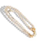 A CULTURED BAROQUE PEARL NECKLACE simply strung with an integrated cultured pearl clasp. 90 pearls