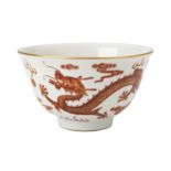 IRON-RED 'DRAGON' BOWL the scrafitto decorated sides painted with two dragons chasing flaming