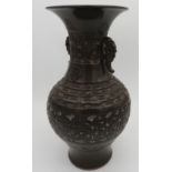 A CHINESE TEA DUST GLAZED ARCHAISTIC STYLE VASE, 19th /20th century, the baluster sides decorated