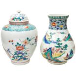 JAPANESE 'KAKIEMON' COVERED JAR 20TH CENTURY the baluster sides decorated with phoenix and