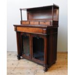 AN EARLY 19TH CENTURY ROSEWOOD CHIFFONIER, galleried top shelf above three short frieze drawers,